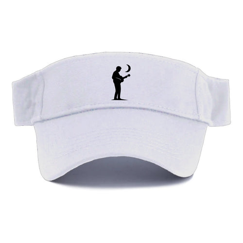 Guitarist playing acoustic under moonlight - Visor