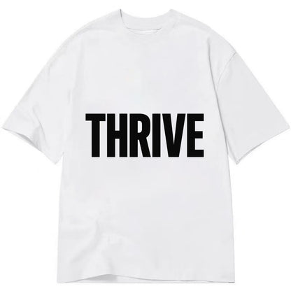 Bold typography design - "THRIVE" - flourishing, doing well - Classic T-shirt - White