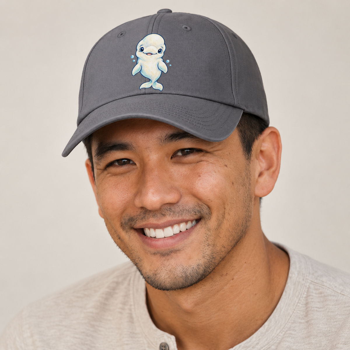 Beluga Whale Front Smile Sea Sprite Baseball Cap — studio model wearing the hat