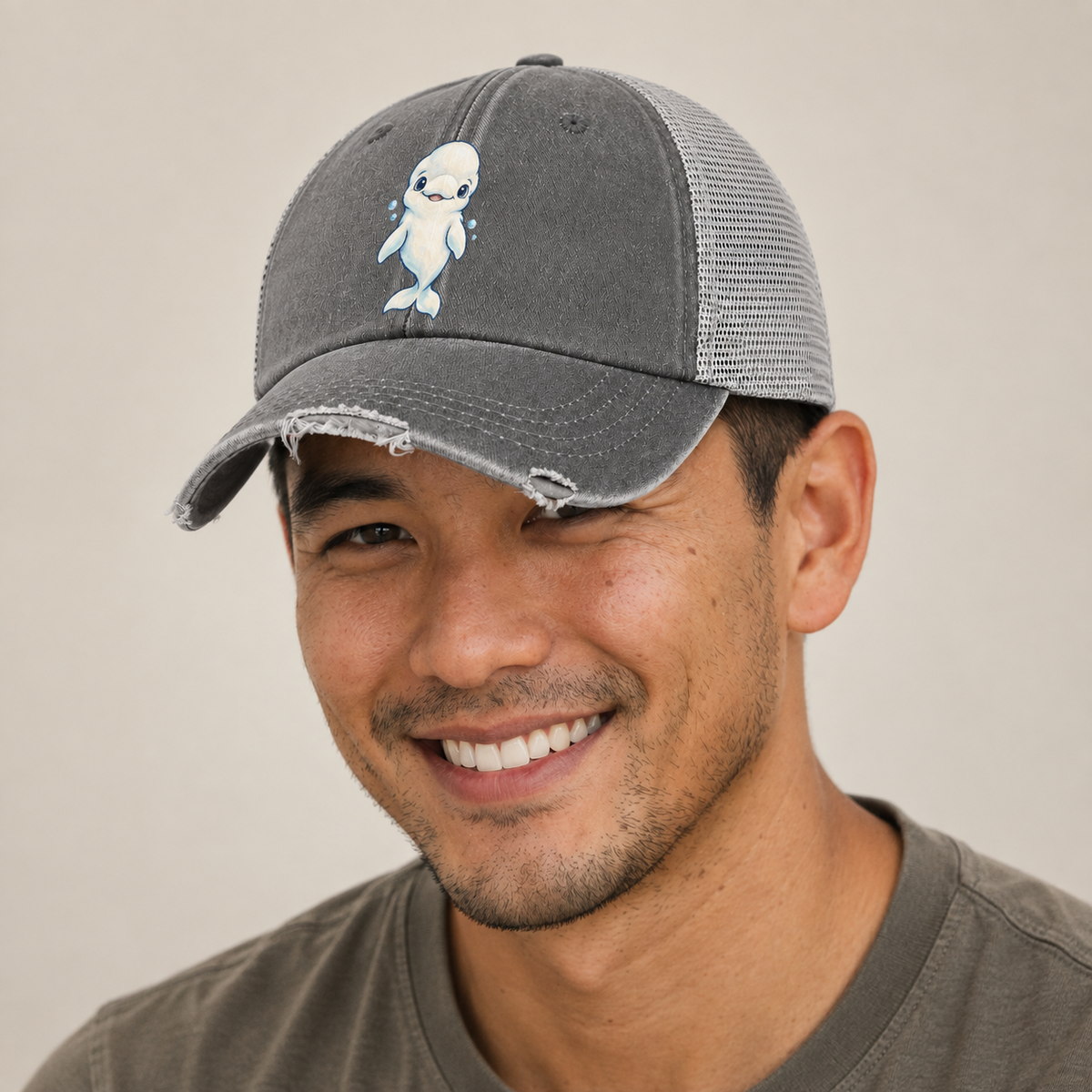 Beluga Whale Front Smile Sea Sprite Washed Trucker Hat — studio model wearing the hat