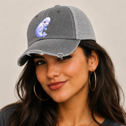 Beluga Whale Gentle Turn Sea Sprite Washed Trucker Hat — studio model wearing the hat