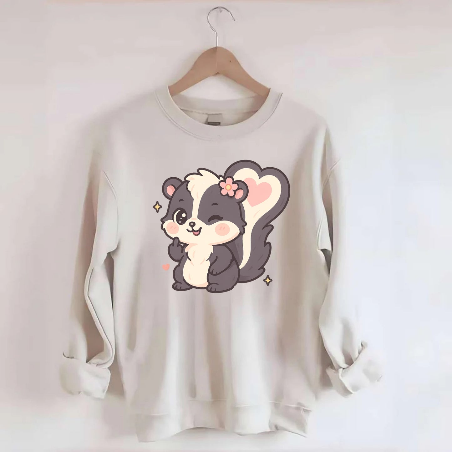 fluffy skunk with heart-shaped tail pattern, one paw up showing sass - Crewneck Sweatshirt - biege