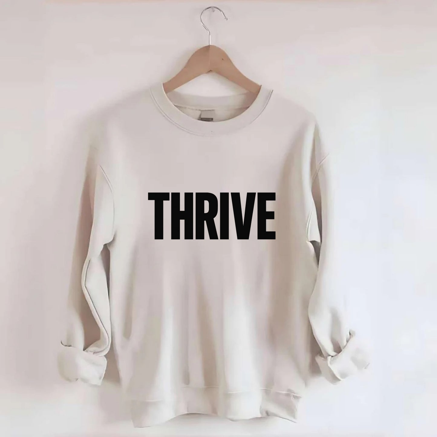 Bold typography design - "THRIVE" - flourishing, doing well - Crewneck Sweatshirt - biege
