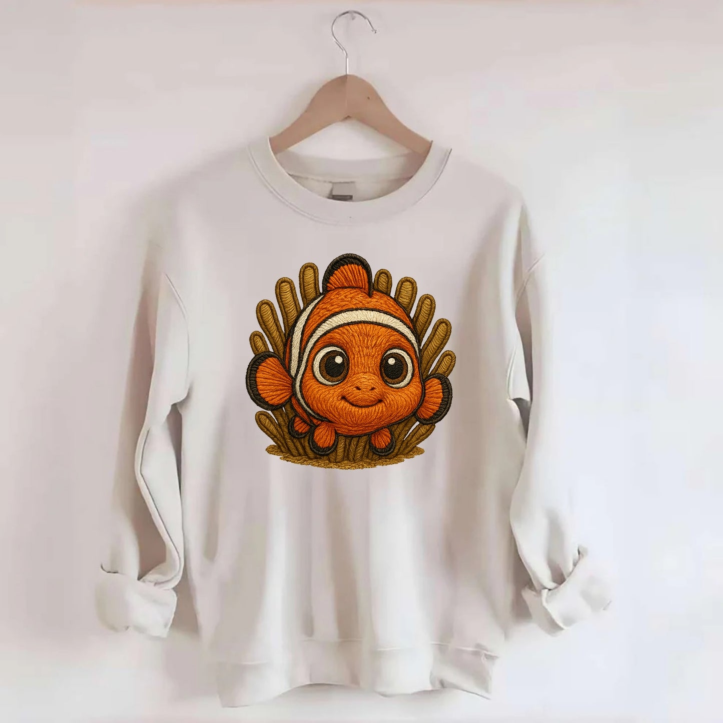 Baby Clownfish - orange with white stripes, big round eyes, front-facing in - Crewneck Sweatshirt - biege