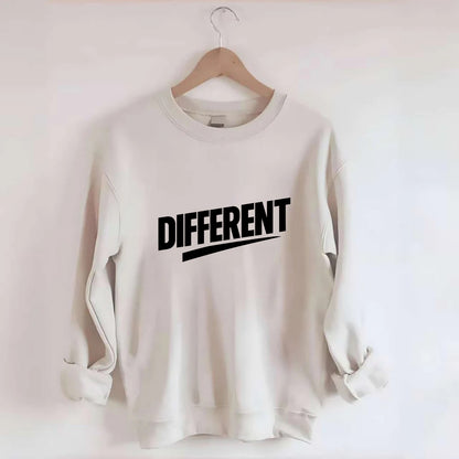 Bold typography design - "DIFFERENT" - standing out, not following crowd - Crewneck Sweatshirt - biege