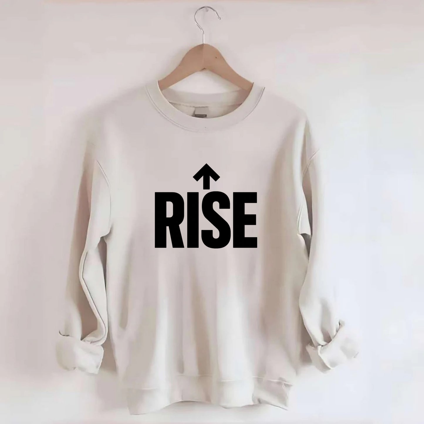 Bold typography design - "RISE" - getting up, ascending, elevating - Crewneck Sweatshirt - biege