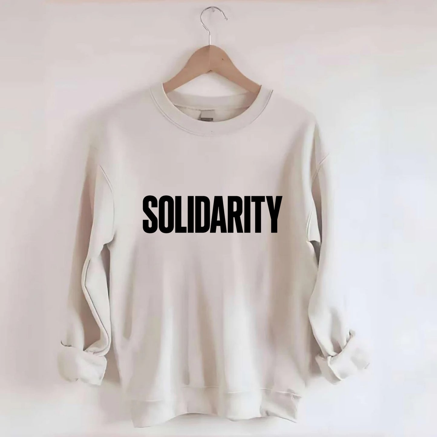 Bold typography design - "SOLIDARITY" - standing together, support - Crewneck Sweatshirt - biege