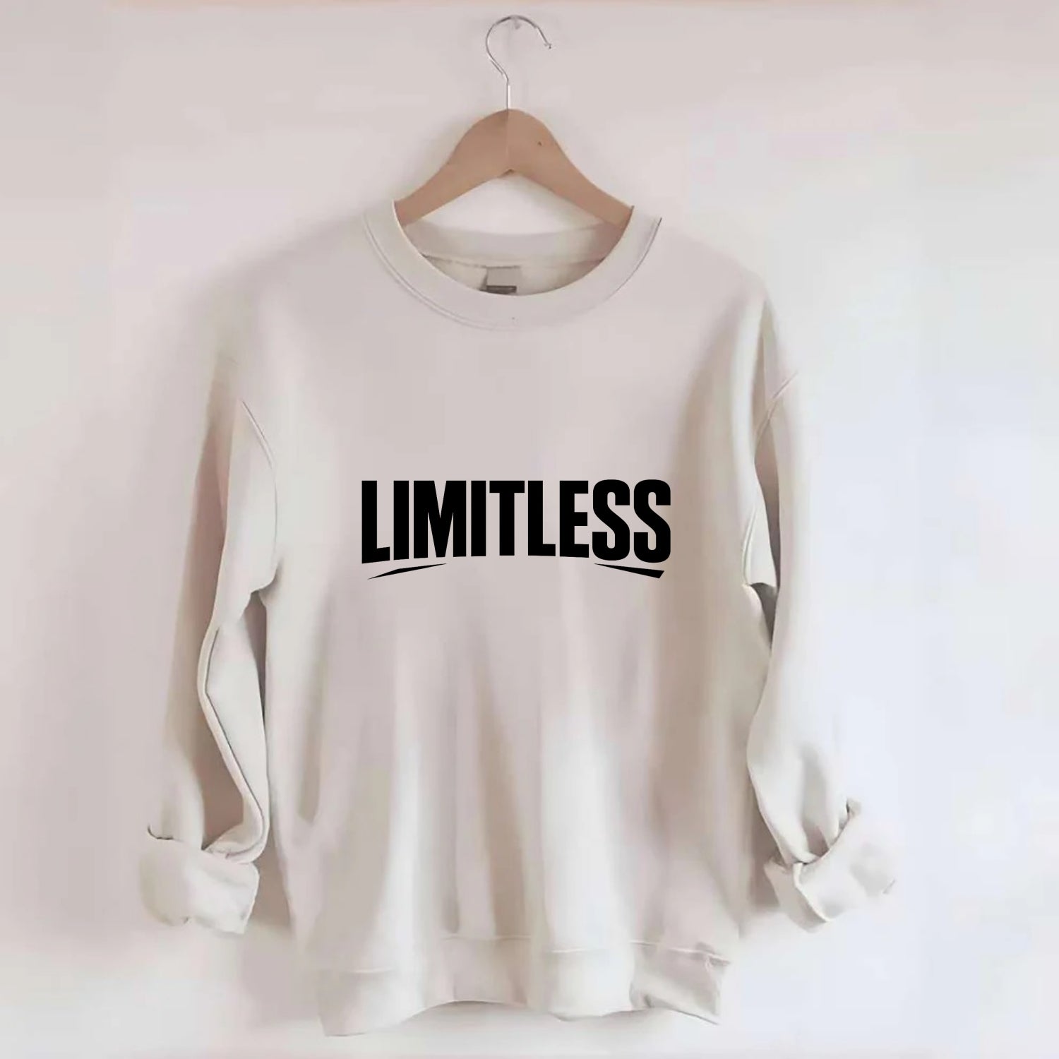 Bold typography design - "LIMITLESS" - no boundaries, infinite potential - Crewneck Sweatshirt - biege