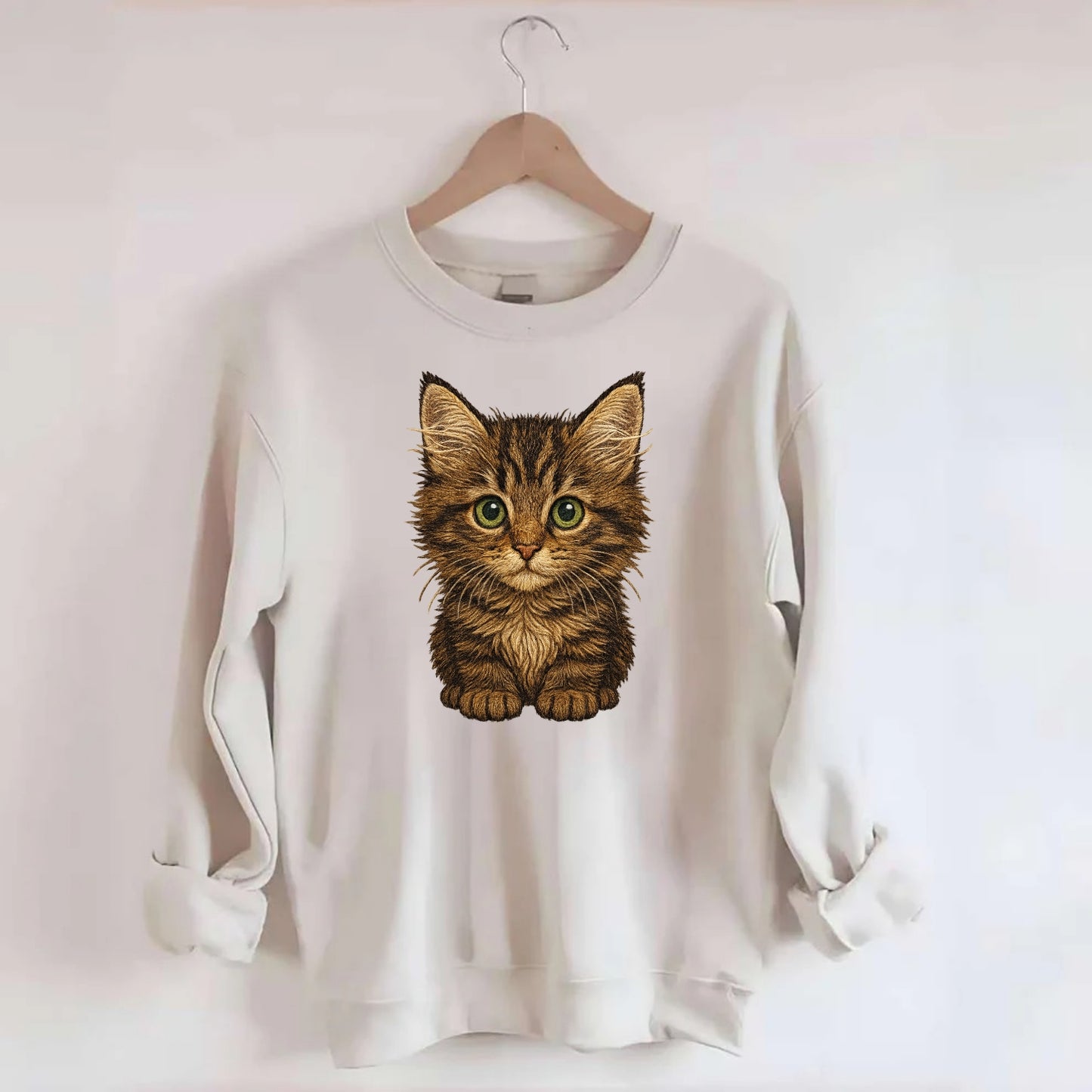 Baby Maine Coon Kitten - large fluffy tabby, tufted ears, big green eyes, - Crewneck Sweatshirt - biege