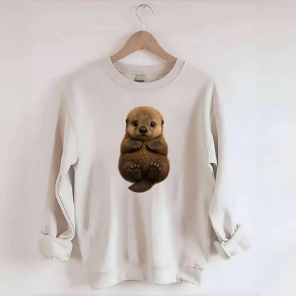 Baby Sea Otter - brown fluffy, floating on back, tiny paws, bright eyes, - Crewneck Sweatshirt - biege