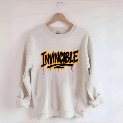 Bold typography design - "INVINCIBLE" - cannot be defeated, unconquerable - Crewneck Sweatshirt - biege