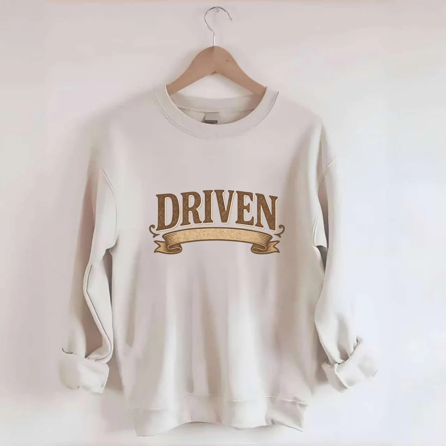 Bold typography design - "DRIVEN" - motivated, focused on goals - Crewneck Sweatshirt - biege