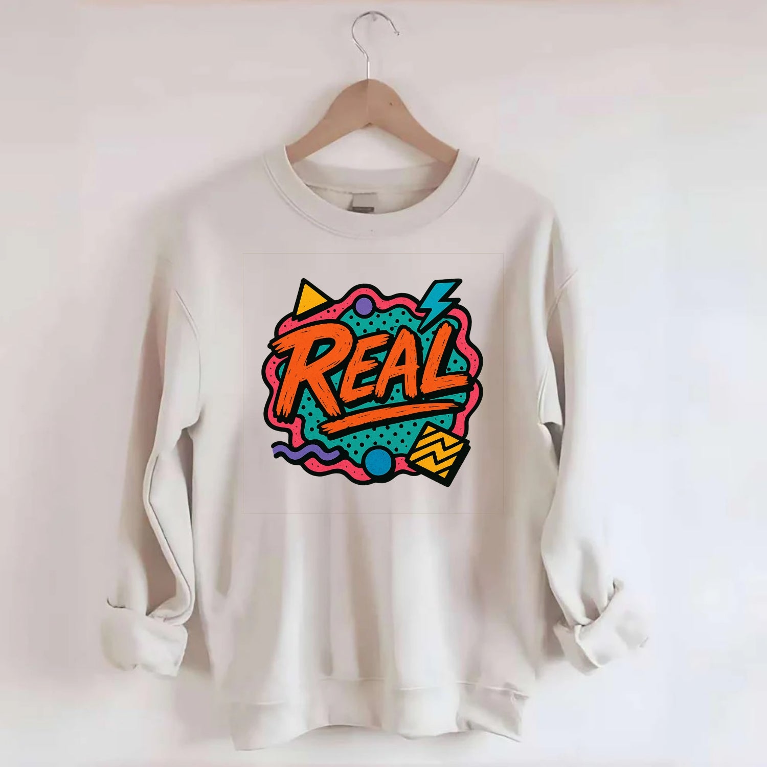 Imperfect brush strokes spelling "Real" - authenticity over perfection, raw - Crewneck Sweatshirt - biege