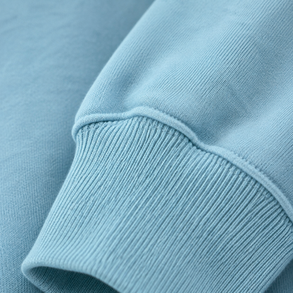 Black Cat Fleece Sweatshirt – light-blue fabric close-up