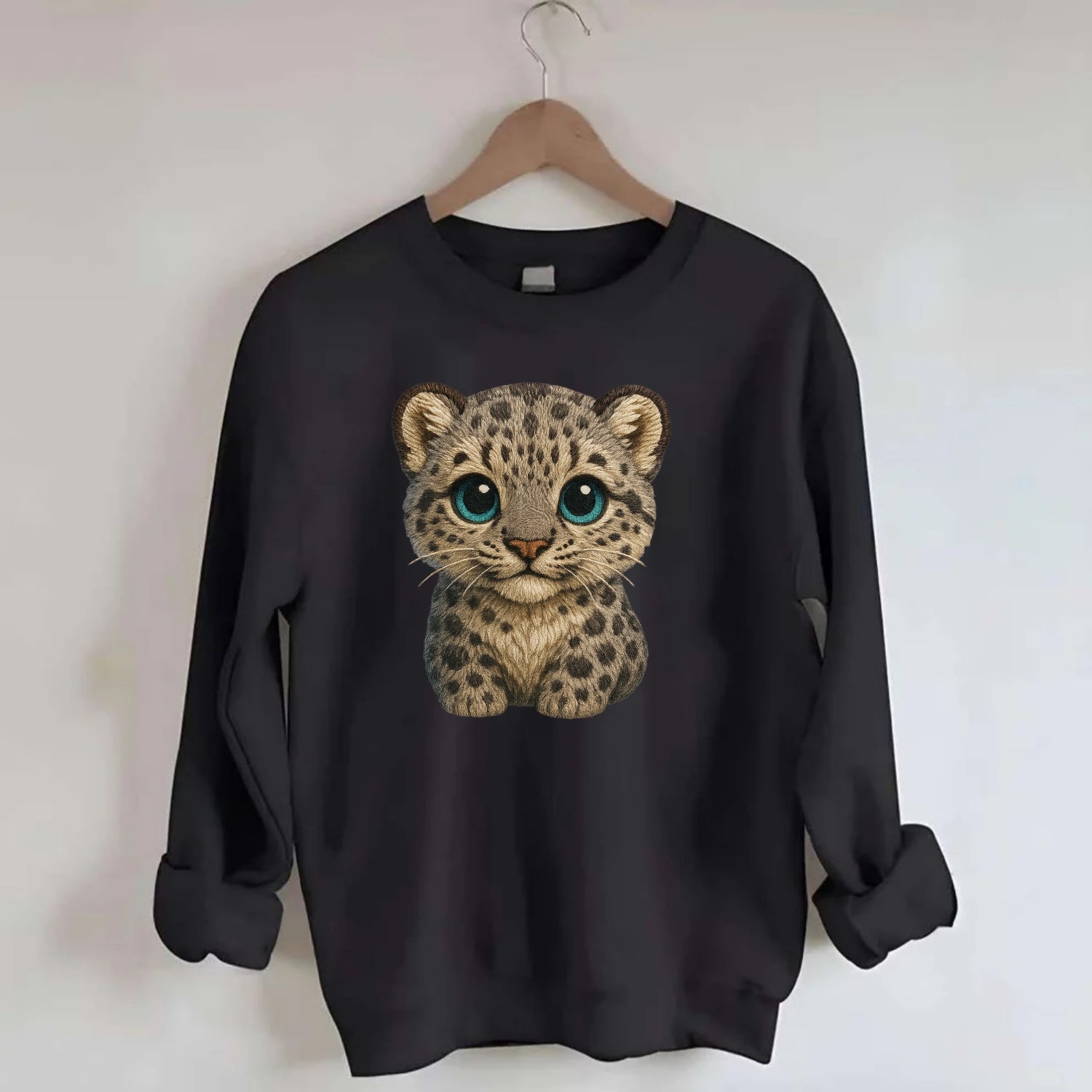 Baby Snow Leopard Cub - gray spotted, thick fur, blue-green eyes, - Crewneck Sweatshirt - black