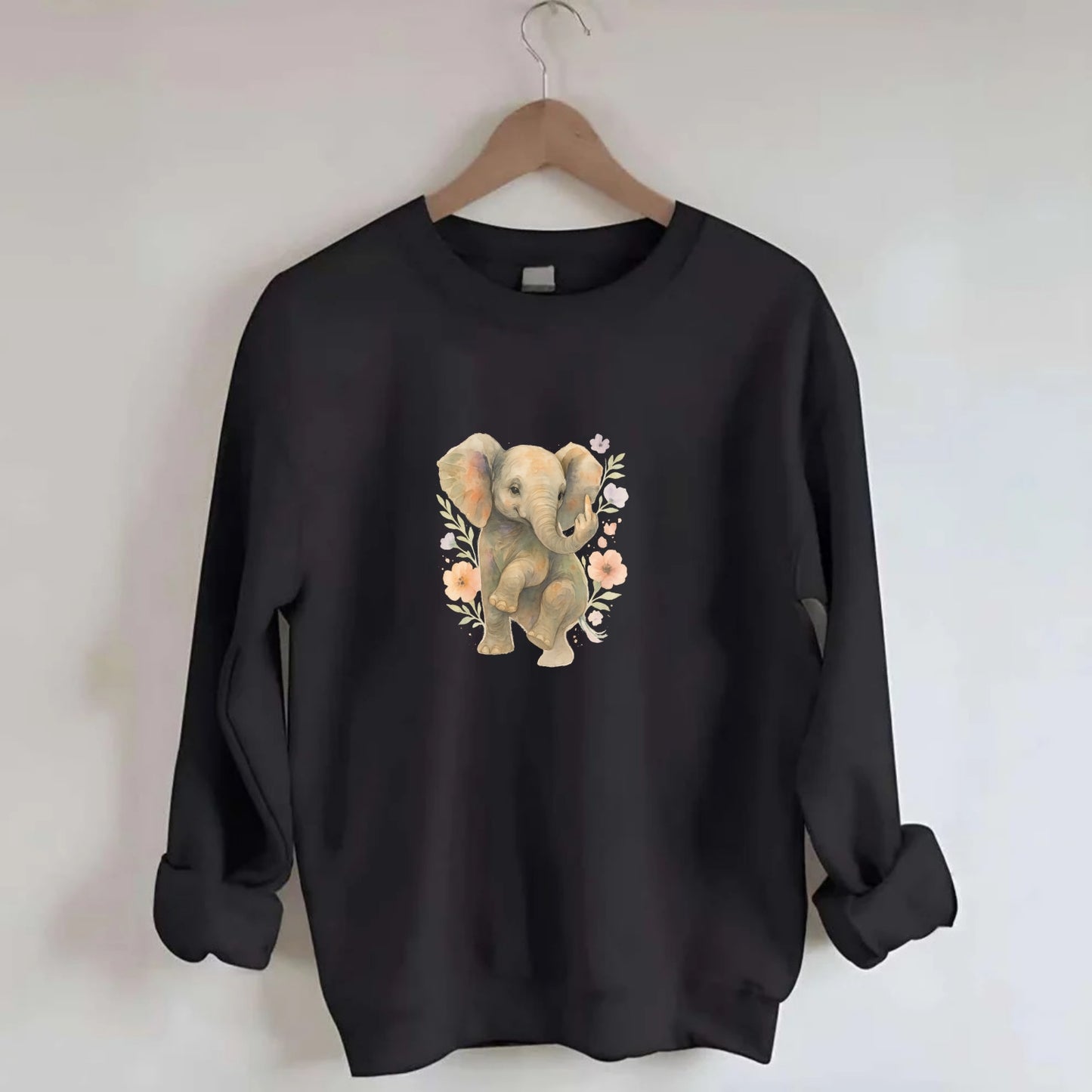 baby elephant with trunk up, one foot raised with middle toe extended - Crewneck Sweatshirt - black