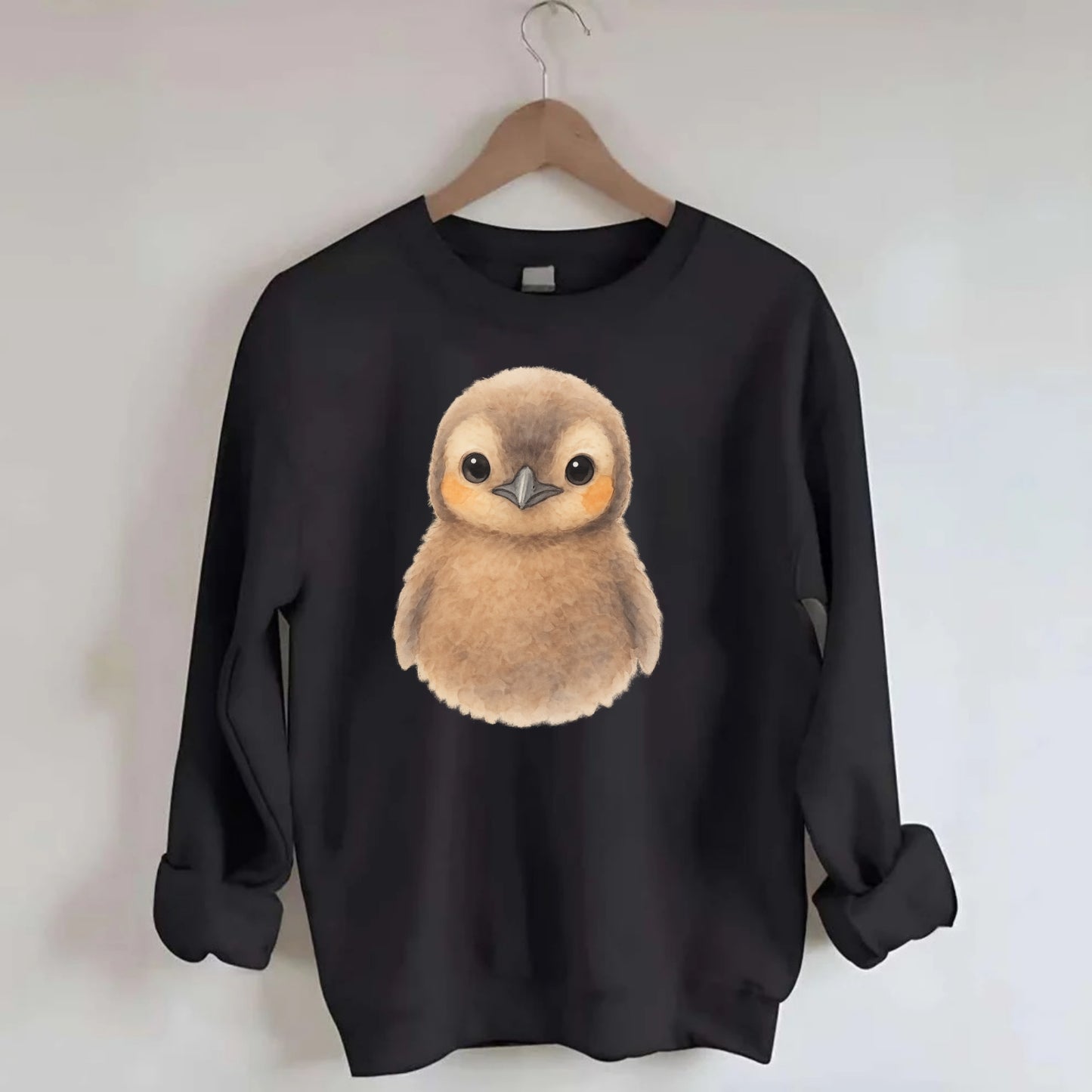 Baby King Penguin - orange cheek patches, fluffy brown, large eyes, - Crewneck Sweatshirt - black