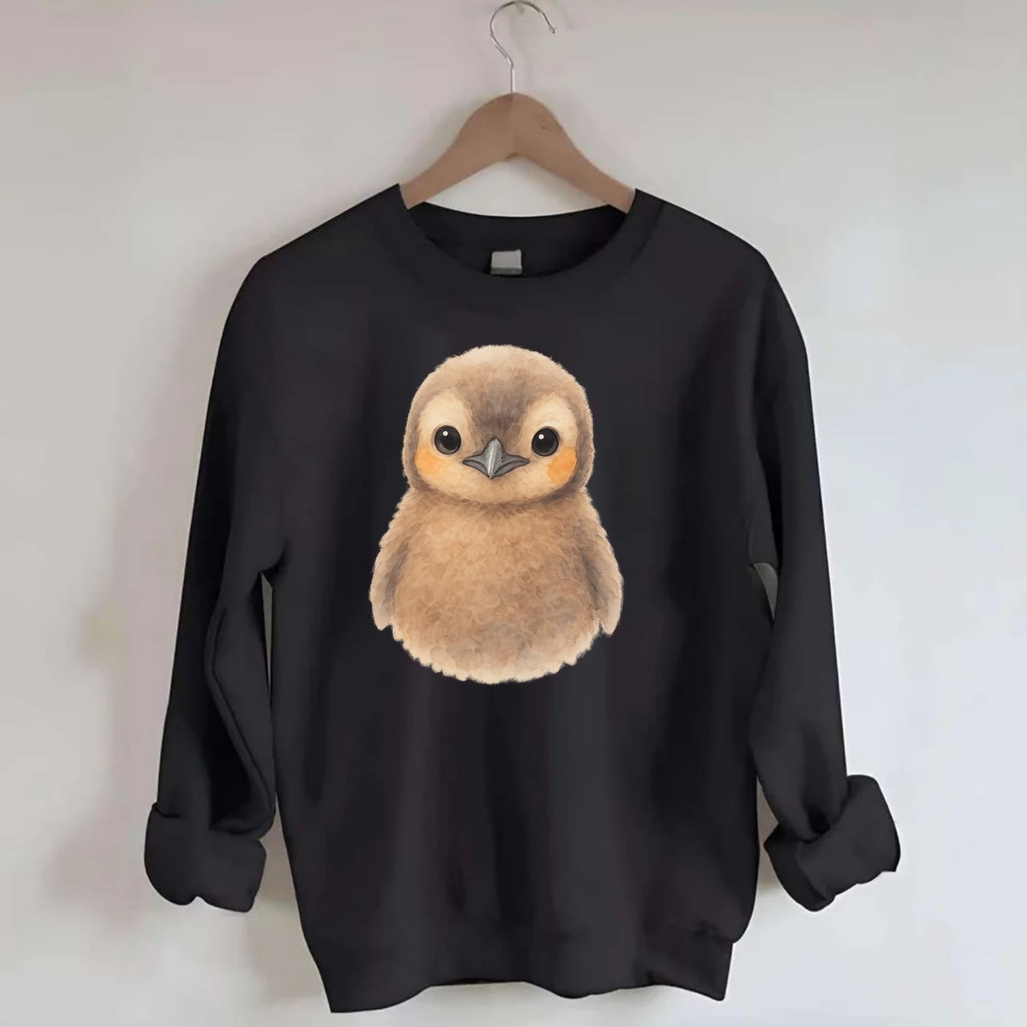 Baby King Penguin - orange cheek patches, fluffy brown, large eyes, - Crewneck Sweatshirt - black