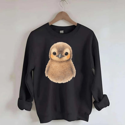 Baby King Penguin - orange cheek patches, fluffy brown, large eyes, - Crewneck Sweatshirt - black