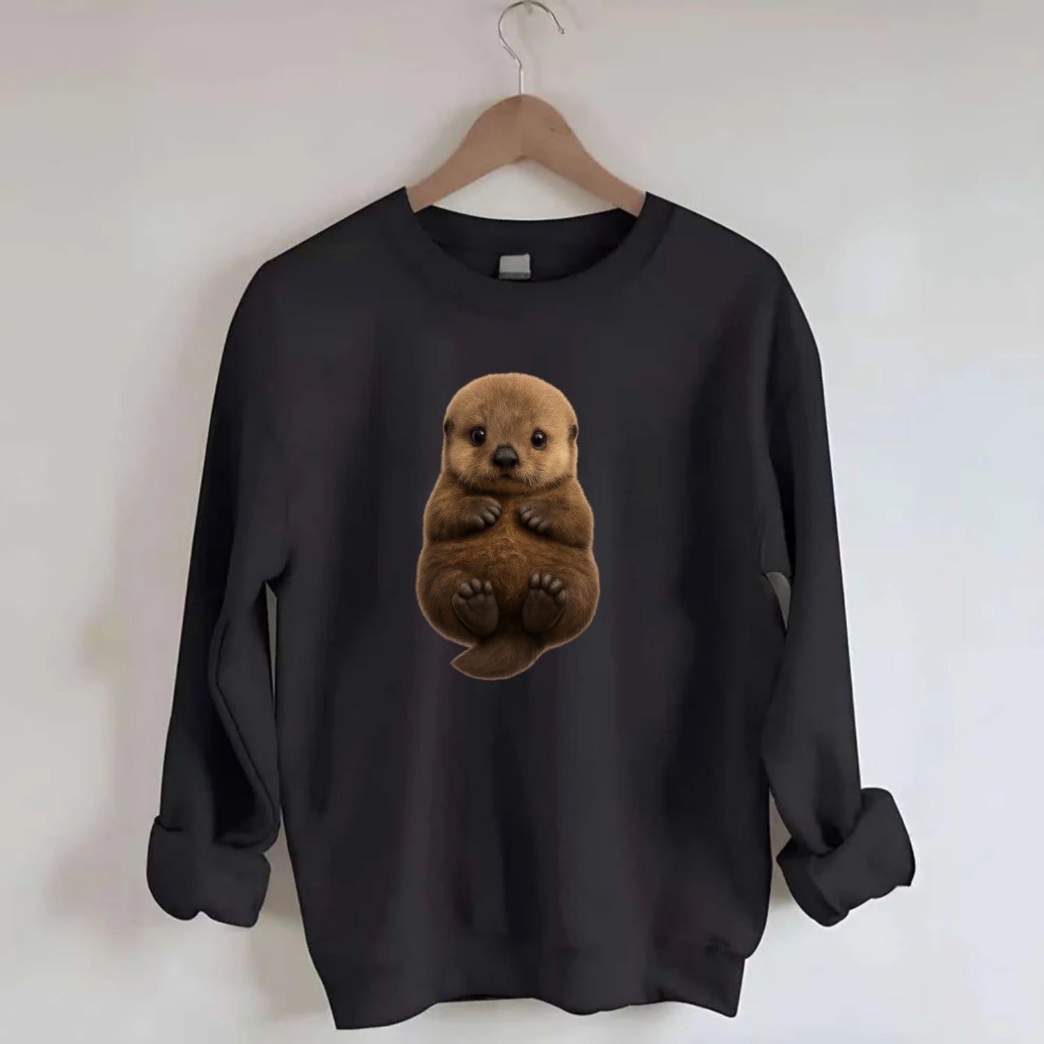 Baby Sea Otter - brown fluffy, floating on back, tiny paws, bright eyes, - Crewneck Sweatshirt - black
