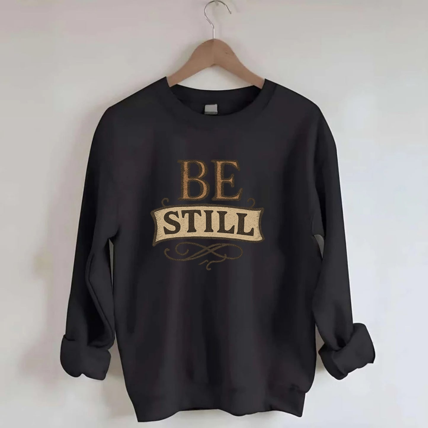 Bold typography design - "BE STILL" - quiet mind, meditation, inner peace - Crewneck Sweatshirt - black