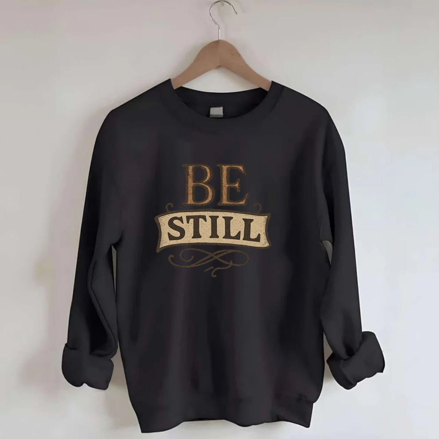 Bold typography design - "BE STILL" - quiet mind, meditation, inner peace - Crewneck Sweatshirt - black