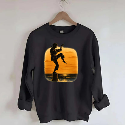 karate crane kick pose on wooden post at beach sunset - Crewneck Sweatshirt - black