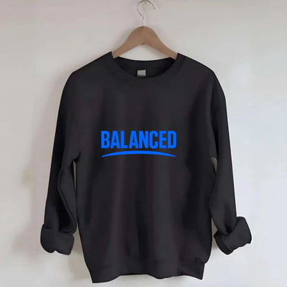 Bold typography design - "BALANCED" - harmony, equilibrium, centered life - Crewneck Sweatshirt - black