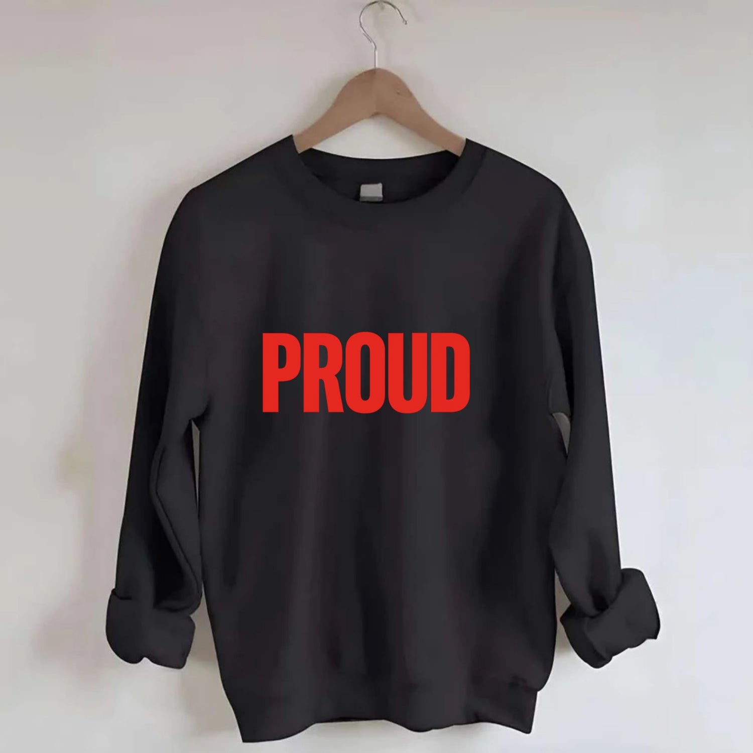Bold typography design - "PROUD" - satisfied, honored, dignified - Crewneck Sweatshirt - black