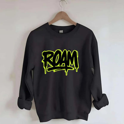 Bold typography design - "ROAM" - wander freely, no destination needed - Crewneck Sweatshirt - black