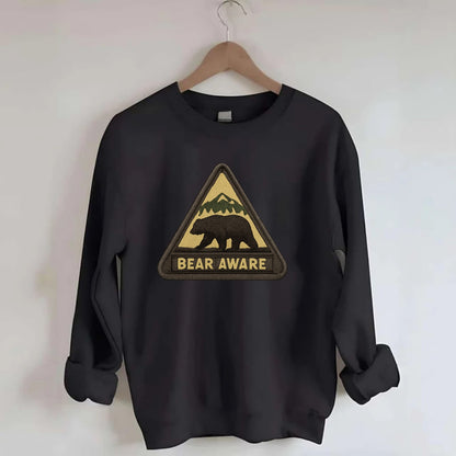 BEAR AWARE - bear silhouette warning in brown and yellow , wilderness safety - Crewneck Sweatshirt - black