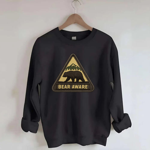BEAR AWARE - bear silhouette warning in brown and yellow , wilderness safety - Crewneck Sweatshirt