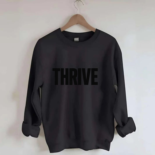 Bold typography design - "THRIVE" - flourishing, doing well - Crewneck Sweatshirt - black