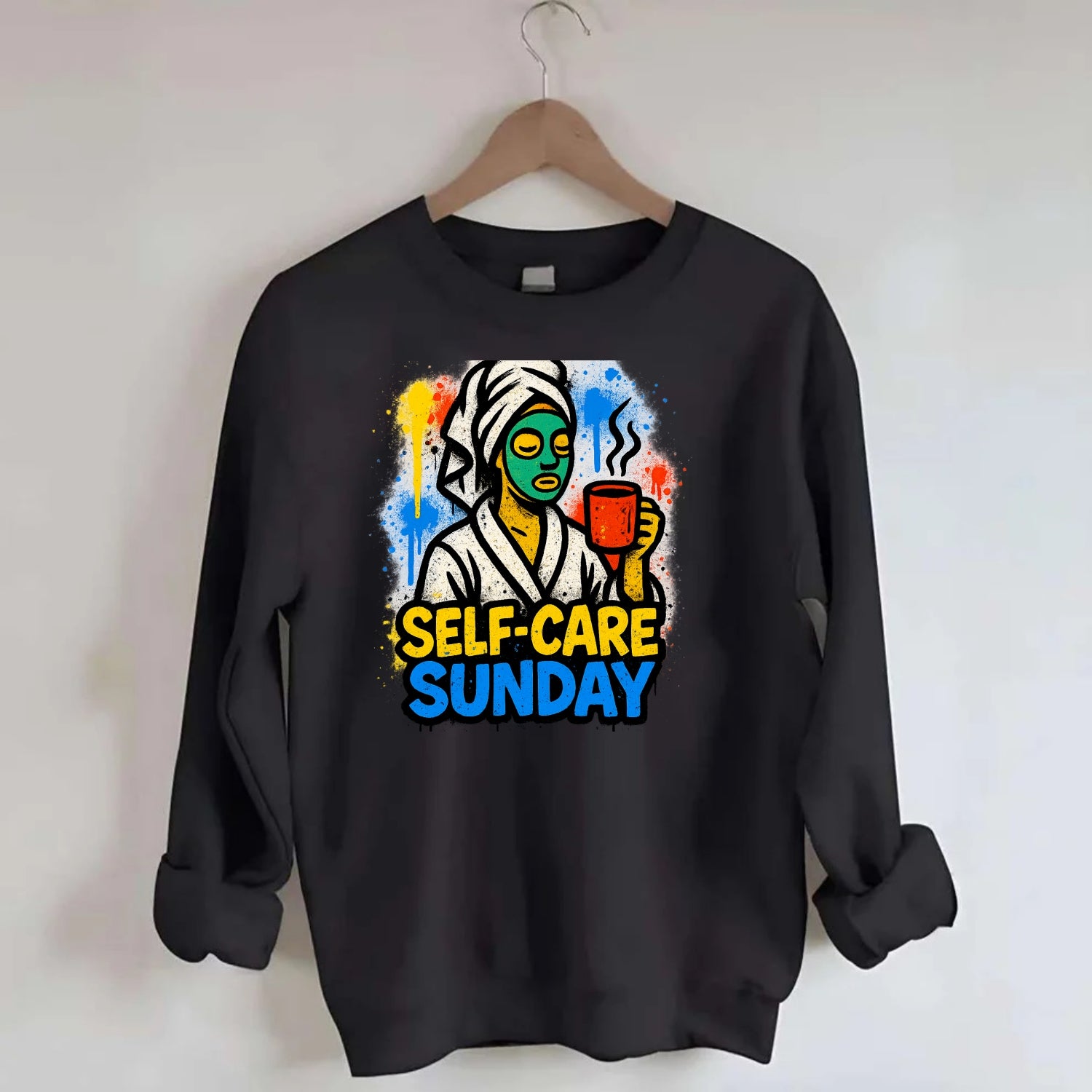Person in bathrobe with face mask and tea - self-care Sunday ritual, wellness - Crewneck Sweatshirt - black