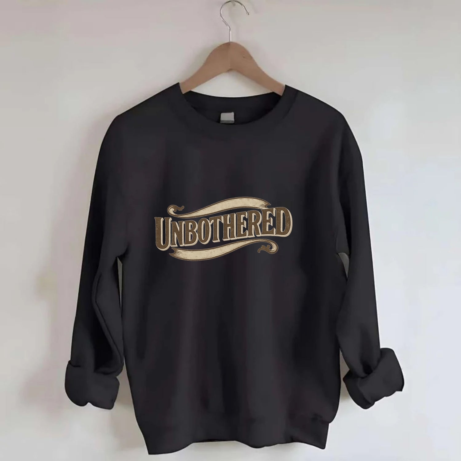 Bold typography design - "UNBOTHERED" - not affected, staying calm - Crewneck Sweatshirt - black