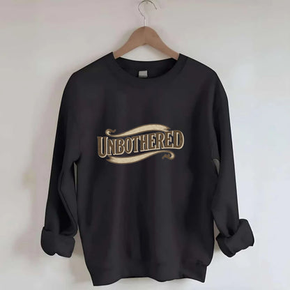 Bold typography design - "UNBOTHERED" - not affected, staying calm - Crewneck Sweatshirt - black