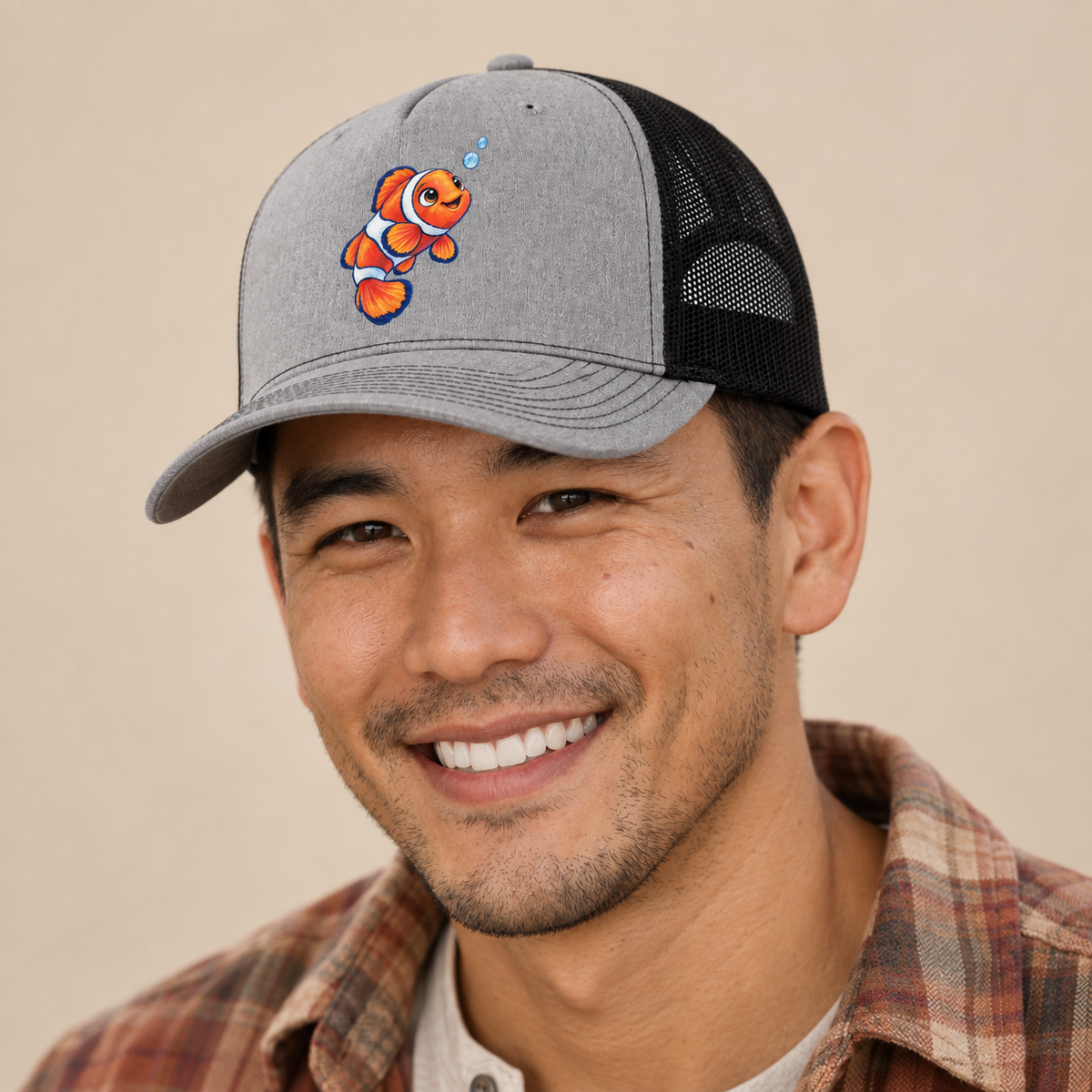 Clownfish Upward Flick Sea Sprite Trucker Hat — studio model wearing the hat