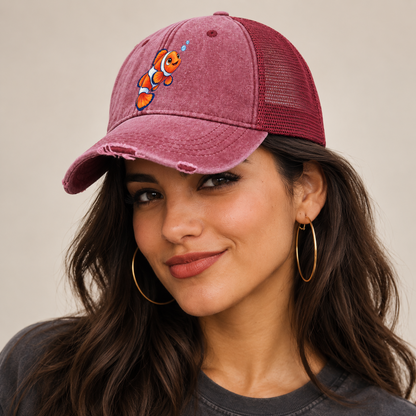 Clownfish Upward Flick Sea Sprite Washed Trucker Hat — studio model wearing the hat