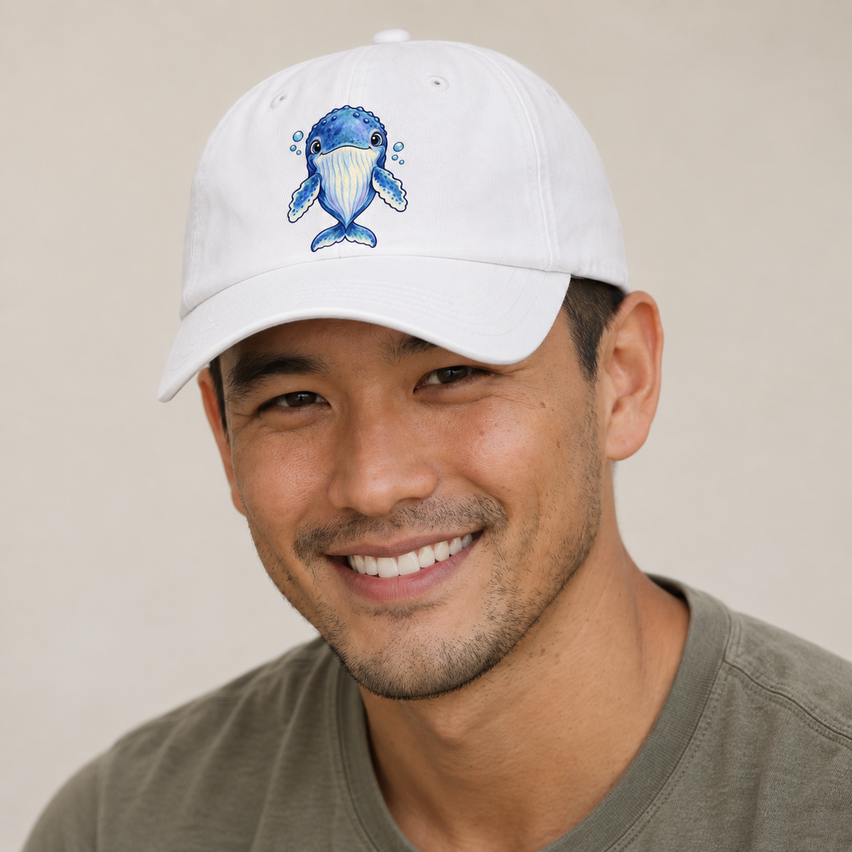 Humpback Whale Front Float Sea Sprite Baseball Cap — studio model wearing the hat