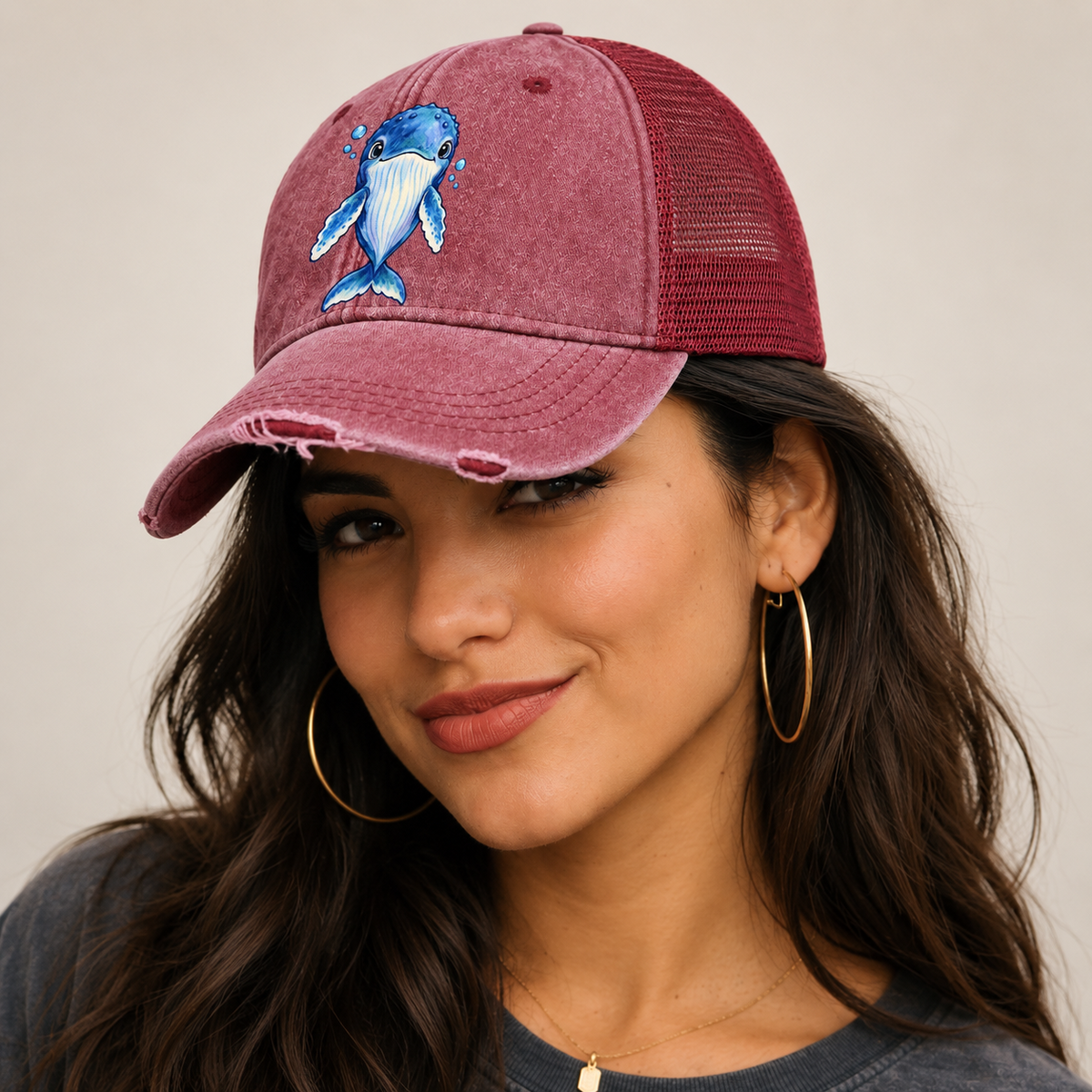 Humpback Whale Front Float Sea Sprite Washed Trucker Hat — studio model wearing the hat