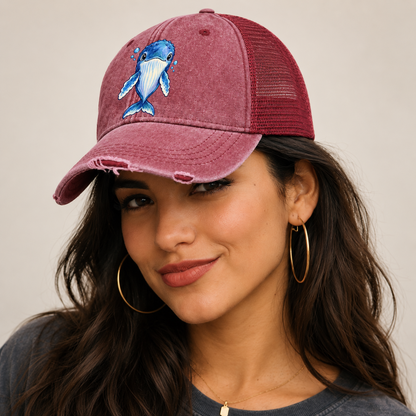 Humpback Whale Front Float Sea Sprite Washed Trucker Hat — studio model wearing the hat