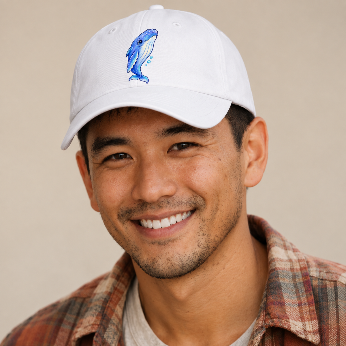 Humpback Whale Gentle Rise Sea Sprite Baseball Cap — studio model wearing the hat