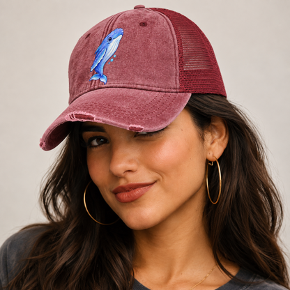 Humpback Whale Gentle Rise Sea Sprite Washed Trucker Hat — studio model wearing the hat
