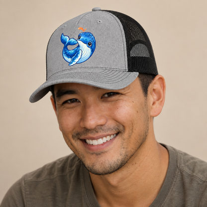 Humpback Whale Tail Curl Sea Sprite Trucker Hat — studio model wearing the hat