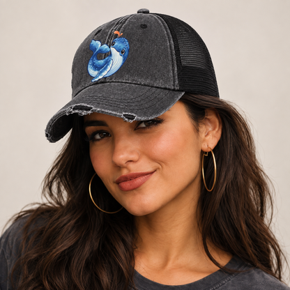 Humpback Whale Tail Curl Sea Sprite Washed Trucker Hat — studio model wearing the hat