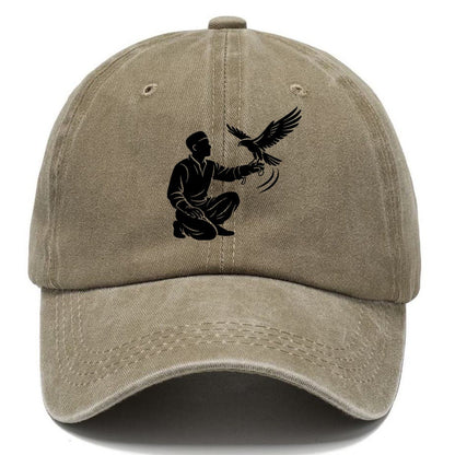 Kneeling Falconer with Falcon Classic Cap – Warm Sand