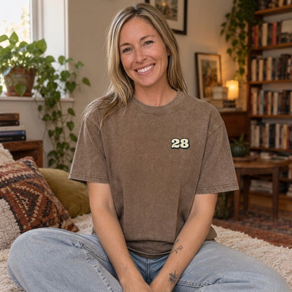 Brown — worn by a model