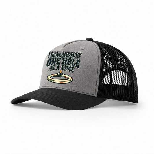 One Hole At A Time Treasure Hunting Trucker Hat – Grey Black