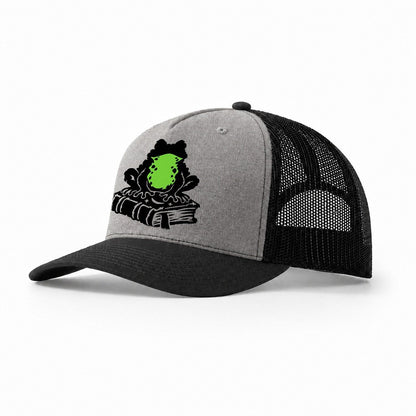 Familiar Toad On A Spellbook Witch Magic Trucker Hat – Grey Black