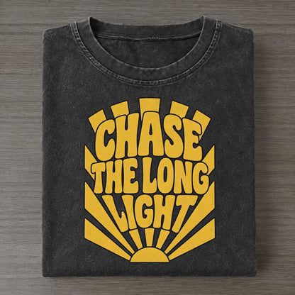 Chase The Long Light Sunburst Sayings Vintage T-shirt – Black